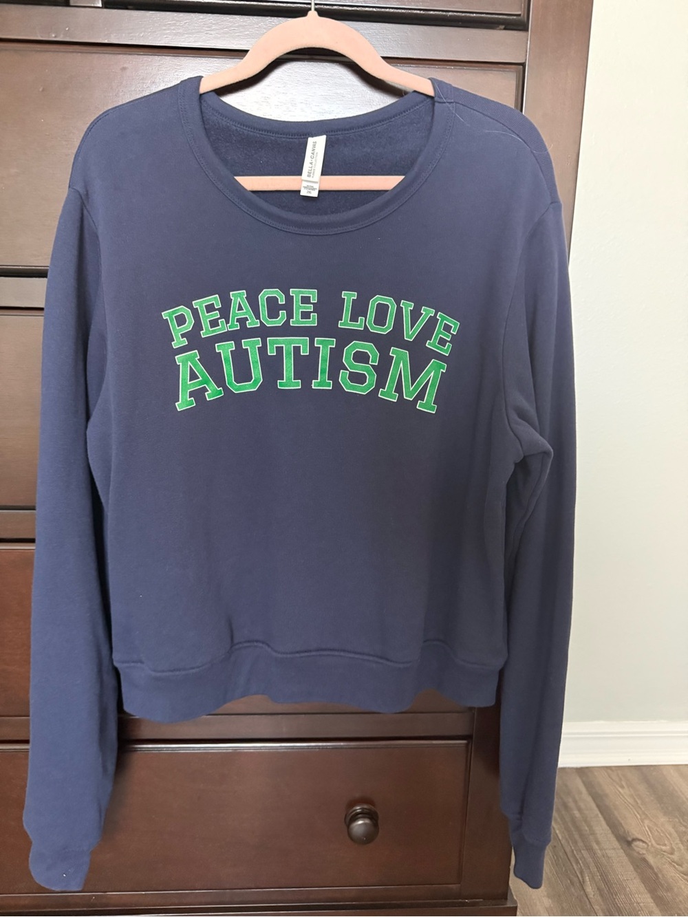 Bella Canvas Navy Blue Sweatshirt with Green "Peace Love Autism" Graphic